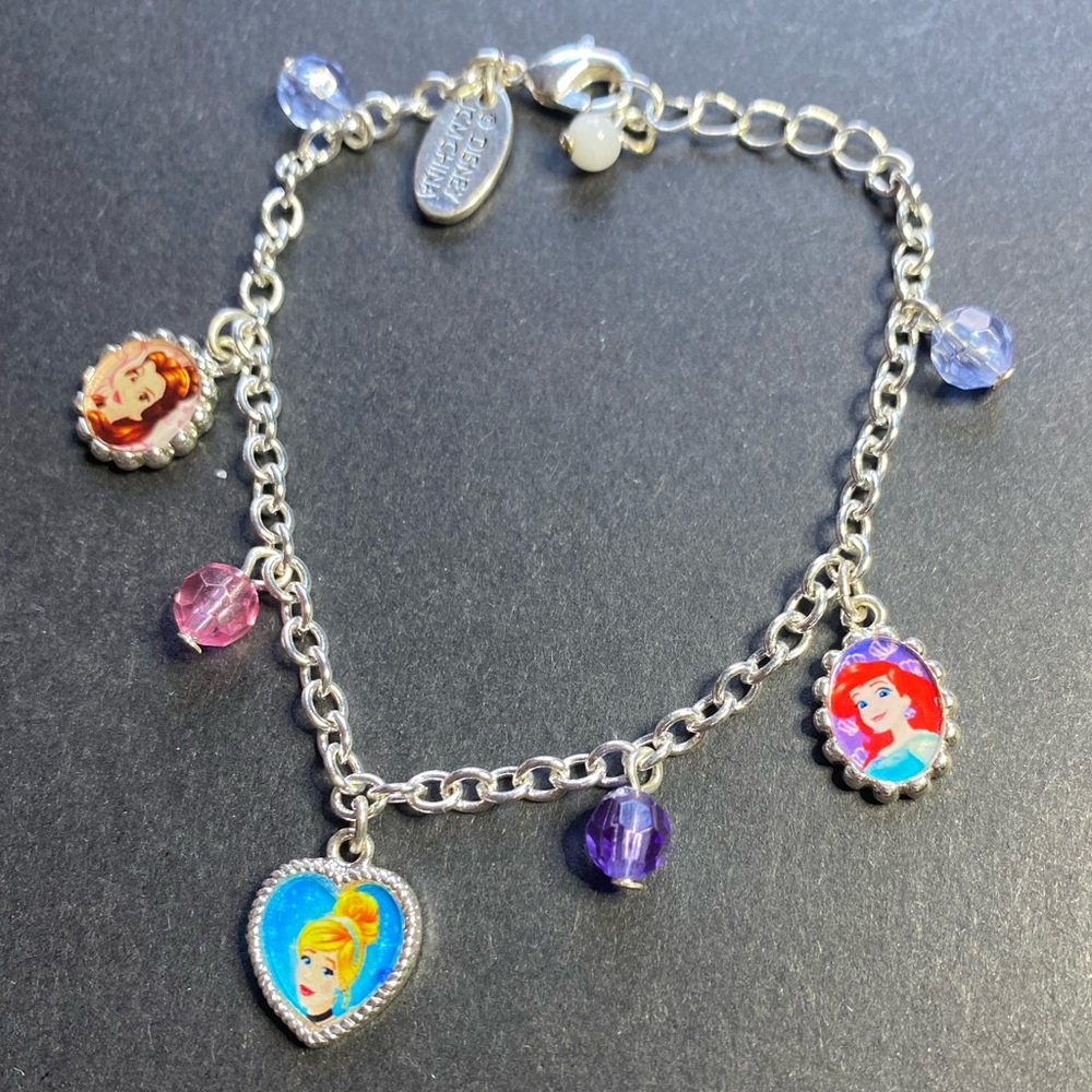 Disney Princess silver toned charm bracelet featuring Cinderella, Belle & Ariel